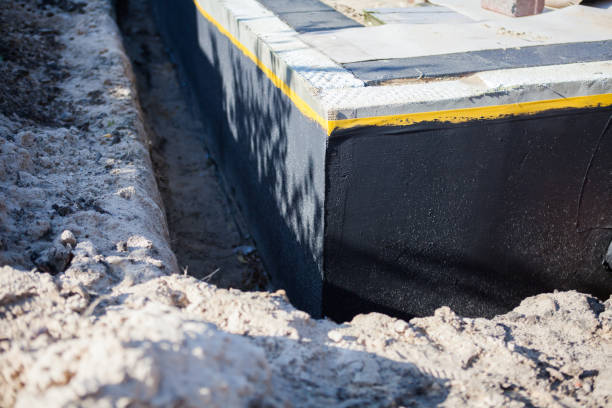 Professional Waterproofing technician working in Charleston, IL